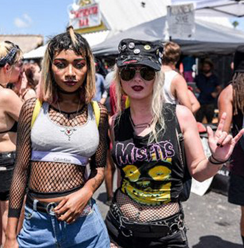 Festival goers wearing band t-shirts